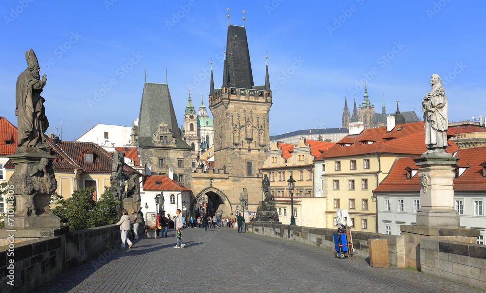 Prague gothic Castle from Charles Bridge with its Statues
