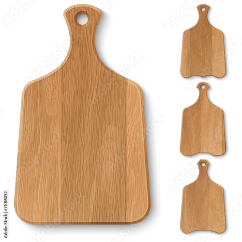 Set of realistic wooden kitchen boards of different shapes