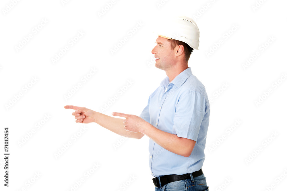 Happy worker presenting copy space. Happy worker presenting copy space.