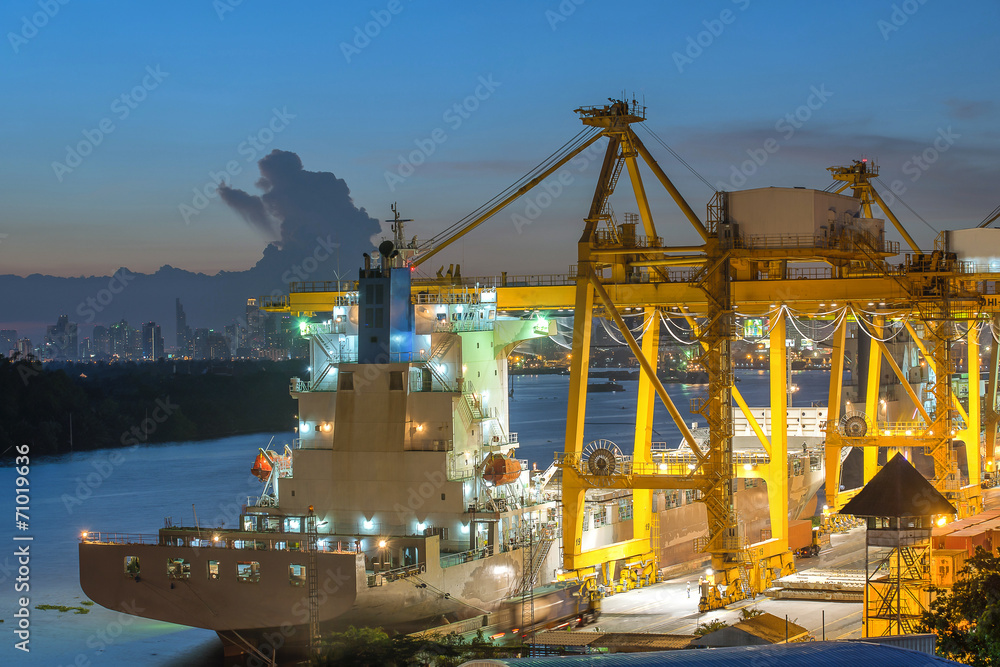 Industrial Container Cargo freight ship with working crane bridg