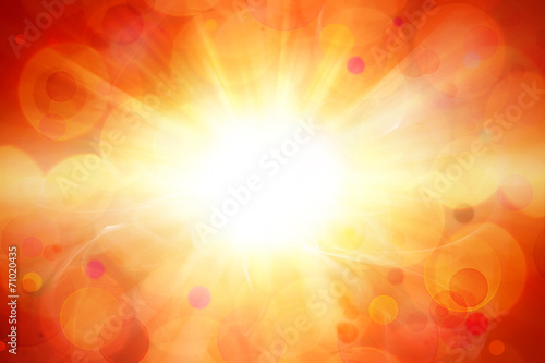 Bright sun rays explosion orange background