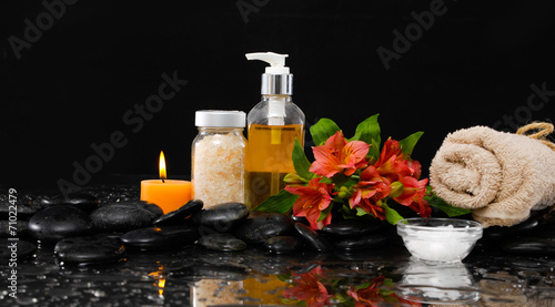 Spa still life with red orchid  massage oil 