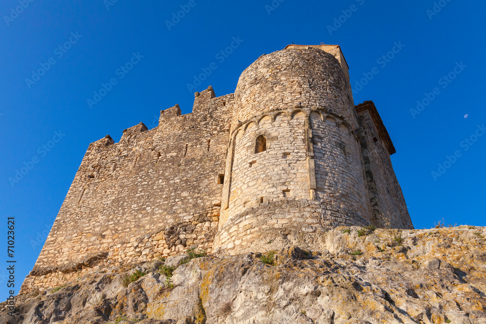 Medieval stone castle on rock in ancient Calafell town, Spain