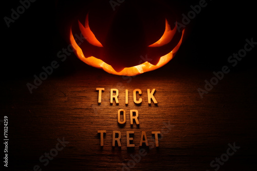 Spooky Halloween background with jack o lantern - Trick or Treat