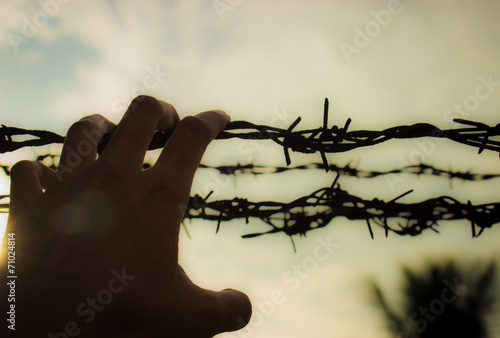 want to climb a barbed fence out.