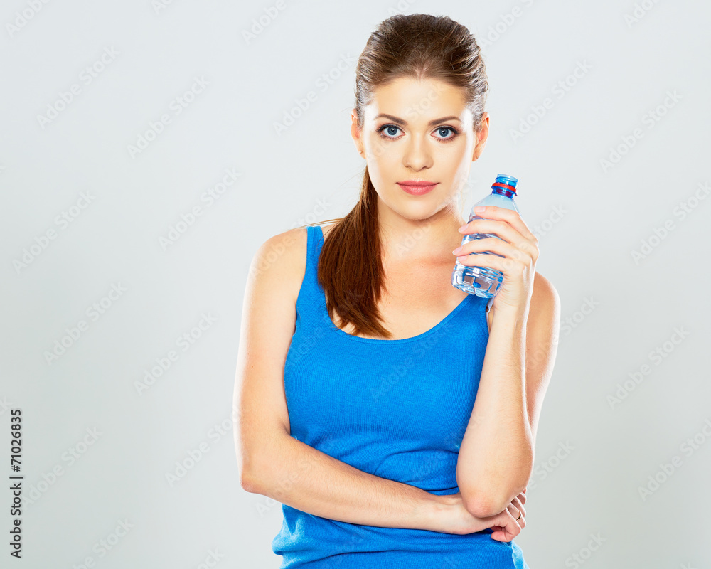 studio portrait of young woman with bottle of water studio portrait of young woman with bottle of water