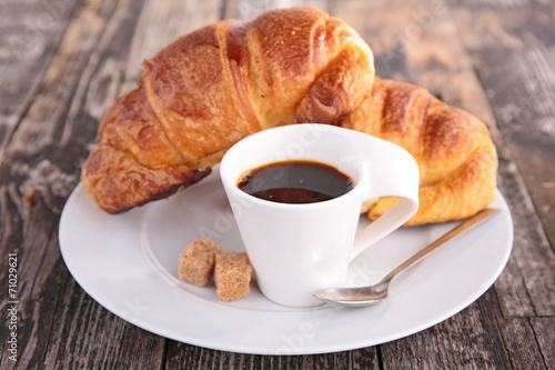 coffee cup and croissant