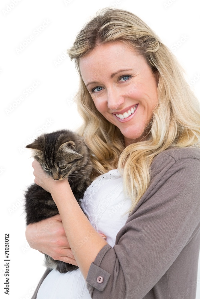 Pretty blonde holding a grey kitten Pretty blonde holding a grey kitten