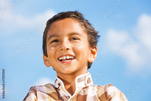 Laughing poy portrait photo