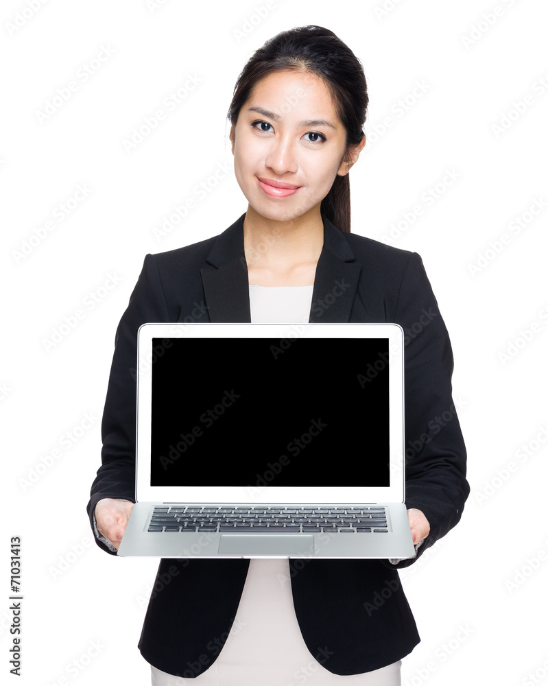 Businesswoman show blank screen of computer Businesswoman show blank screen of computer