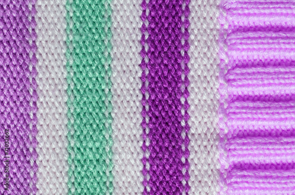 Knit woolen texture. Fabric striped background Knit woolen texture. Fabric striped background
