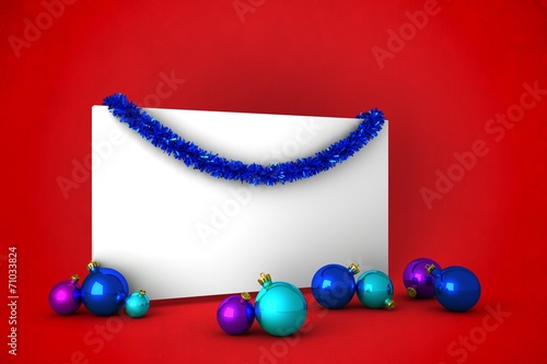 Composite image of christmas decoration and poster