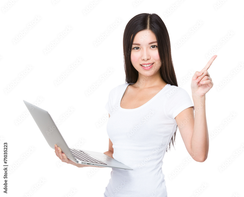 Woman use of notebook and finger point up