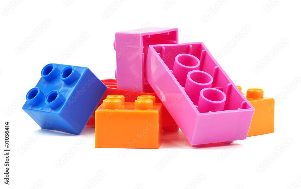 Naklejka premium Toy colorful plastic blocks isolated on white background