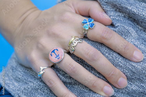 woman's hand with rings