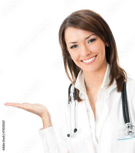 Happy smiling doctor showing  isolated