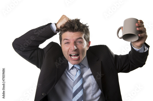 Fotografija crazy businessman holding empty cup in coffee addiction