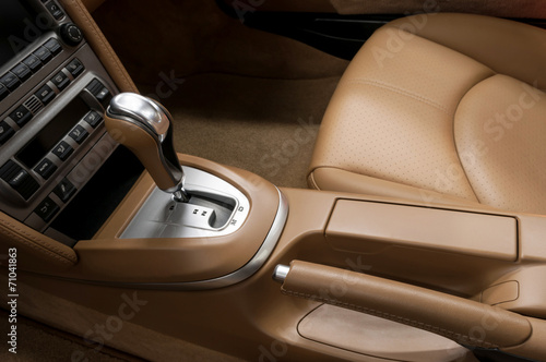Detail interior of modern auto. Gear shift in car.