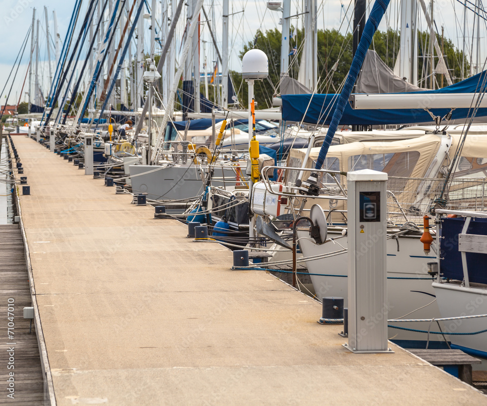Sailing Yachts Parked in a Harbor Sailing Yachts Parked in a Harbor