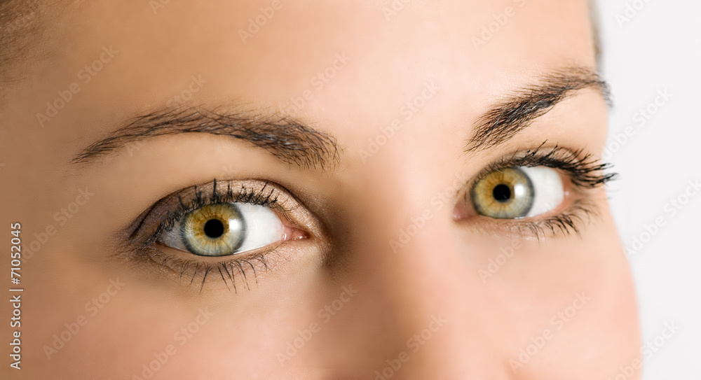 Detail of beautiful green eyes on a young girl Detail of beautiful green eyes on a young girl