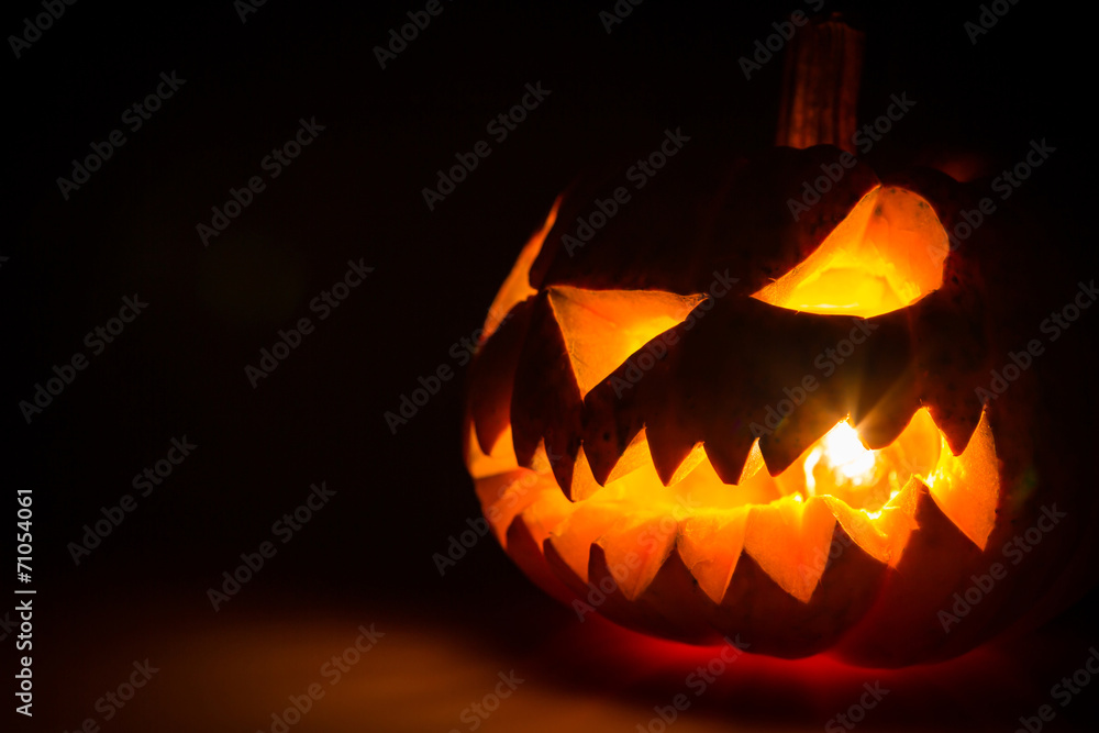 Halloween scary face pumpkin on black background Halloween scary face pumpkin on black background