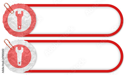 two buttons with texture crumpled paper and spanner
