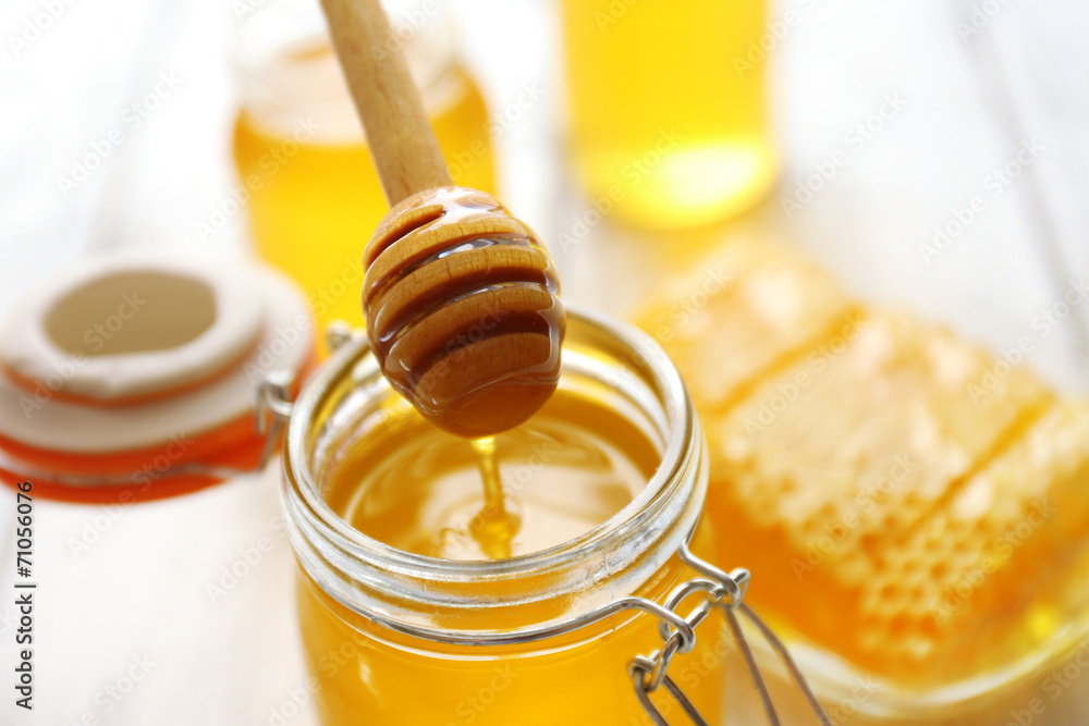 Fresh honey on wooden table Fresh honey on wooden table