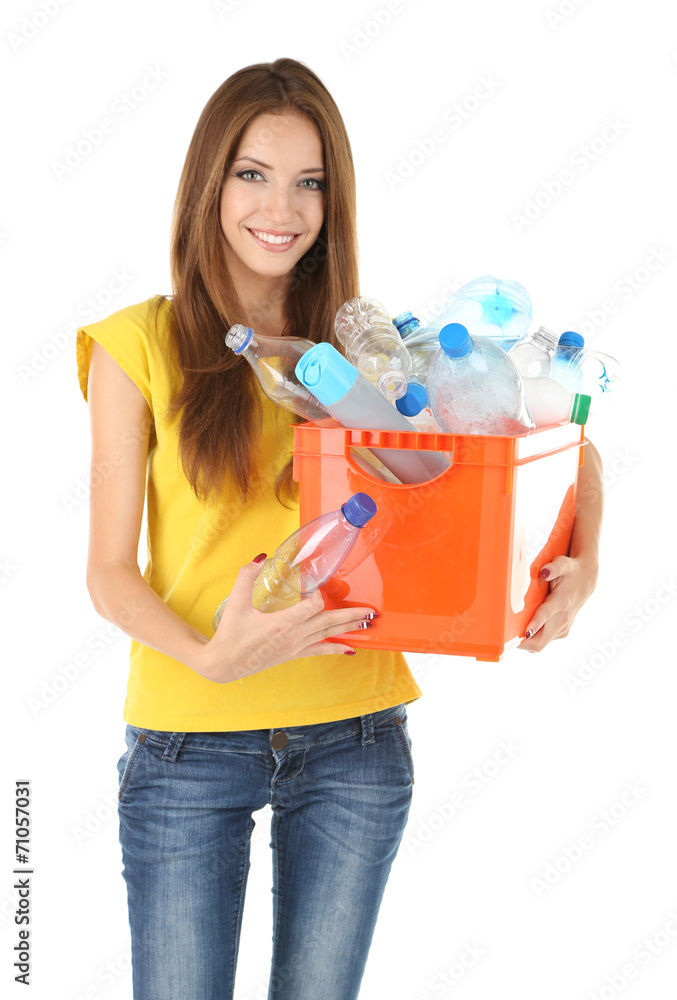 Young girl sorting plastic bottles isolated on white Young girl sorting plastic bottles isolated on white