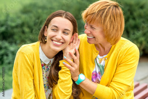 Portrait of mother with her daughter in the park