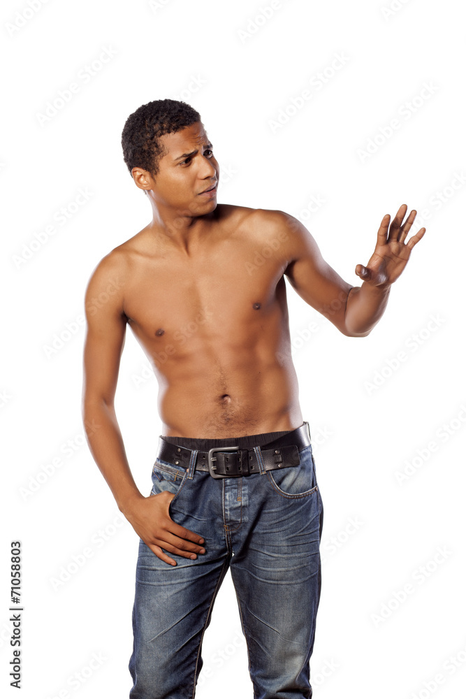 frightened half-naked young african man in self-defense position frightened half-naked young african man in self-defense position