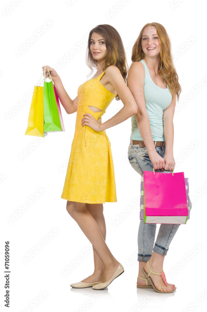Friends with shopping bags isolated on white Friends with shopping bags isolated on white