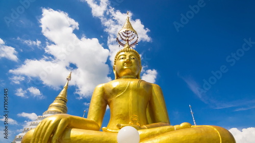 Time Lapse Gold Buddha In Wat Chiang Yeun Temple Of Thailand photo