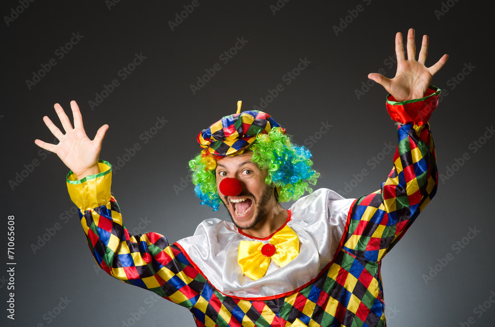 Funny clown in colourful costume Funny clown in colourful costume