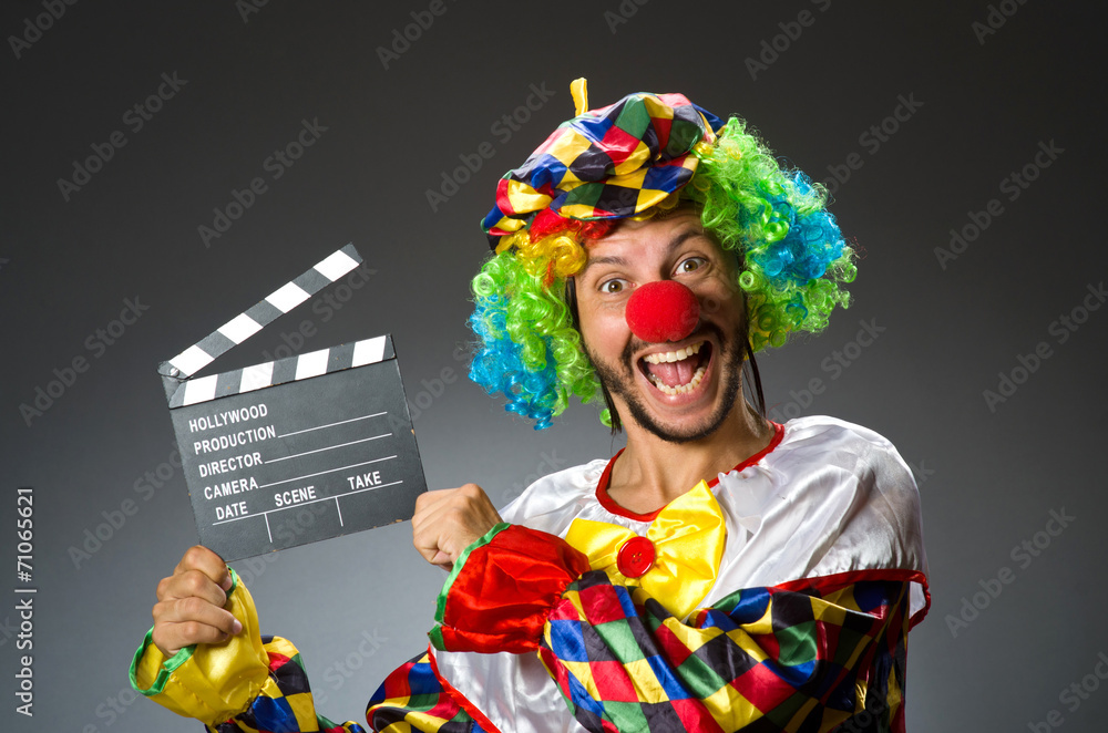Clown with movie clapper board Clown with movie clapper board