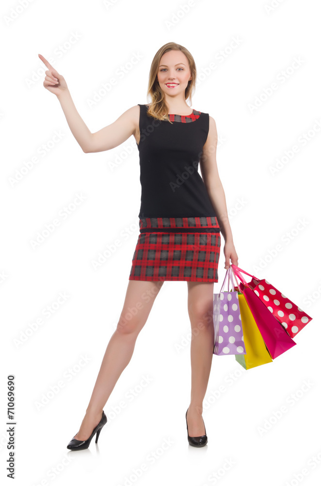 Woman with shopping bags isolated on white Woman with shopping bags isolated on white