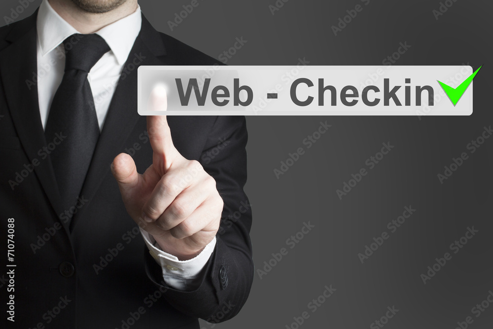 businessman pushing button web checkin airport businessman pushing button web checkin airport