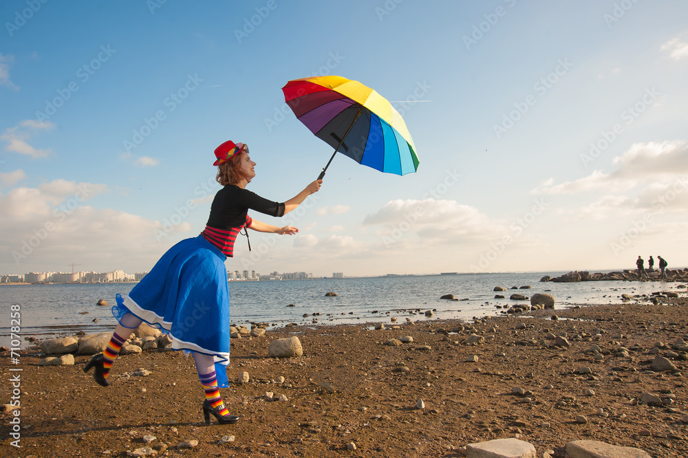 clown with umbrella