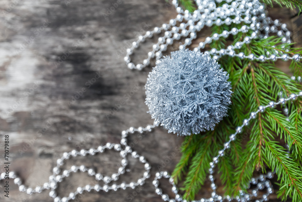 Silver Christmas ball on wooden background Silver Christmas ball on wooden background