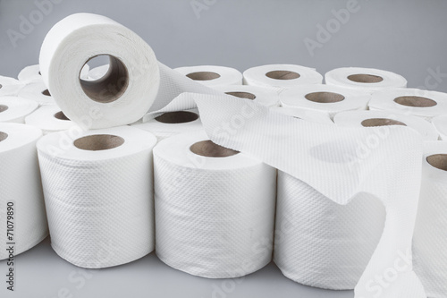 Stack of white tissue paper rolls.