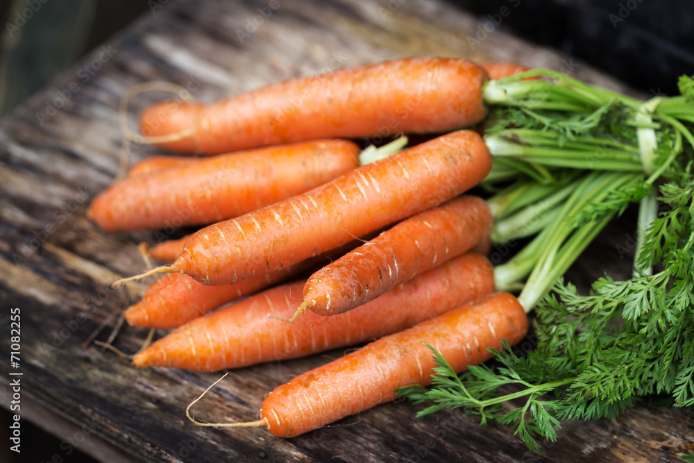 Carrot  on wooden background