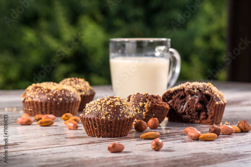 Close-up picture of chocolate cupcake with almonds and hazelnut