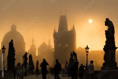 Tourists on Charles bridge early morning