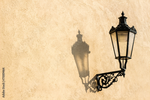 Street lamp with shadow in Prague