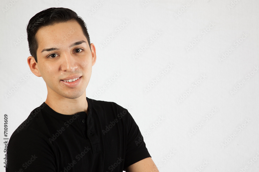 Handsome man smiling at the camera Handsome man smiling at the camera