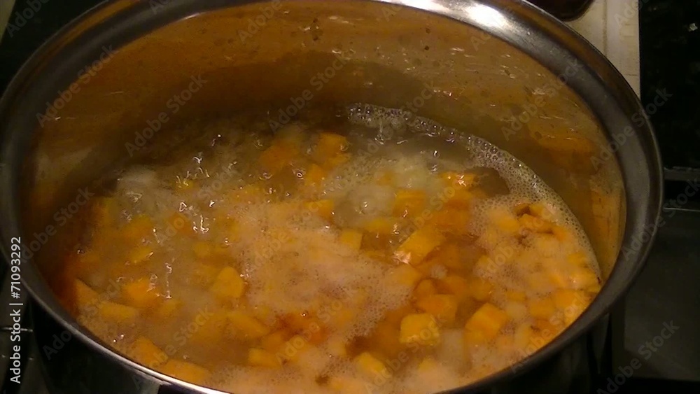 Potatoes and carrots boiling Potatoes and carrots boiling