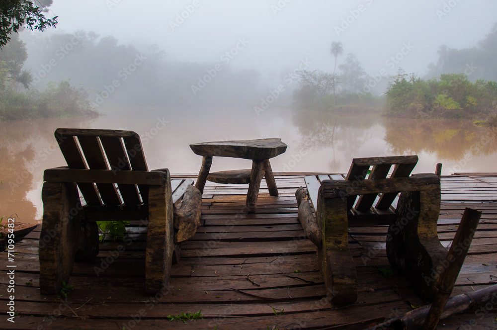 Relaxing on a foggy lake, early morning, Argentina Relaxing on a foggy lake, early morning, Argentina