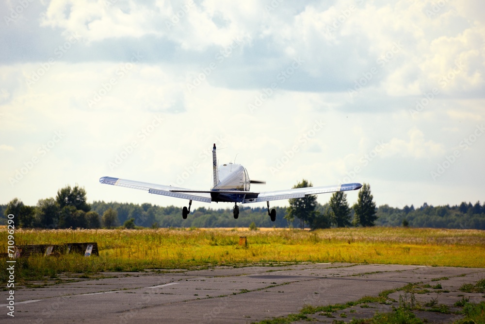 Fototapeta premium Ultralight weight airplane flying in the sky