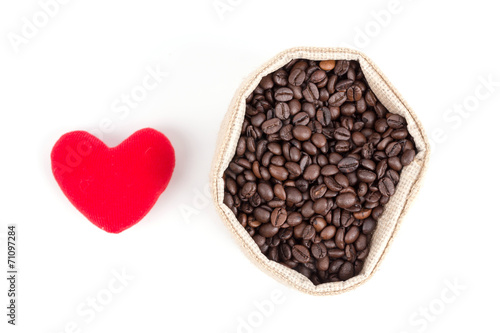 coffee beans in bag isolated on white background © TuTheLens