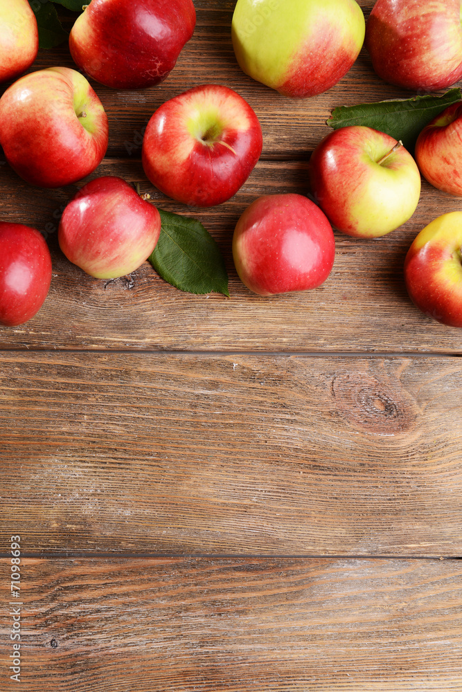 Sweet apples on wooden background Sweet apples on wooden background