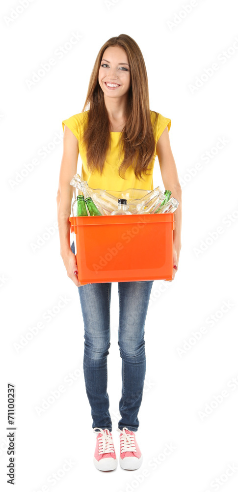 Young girl sorting glass bottles isolated on white Young girl sorting glass bottles isolated on white